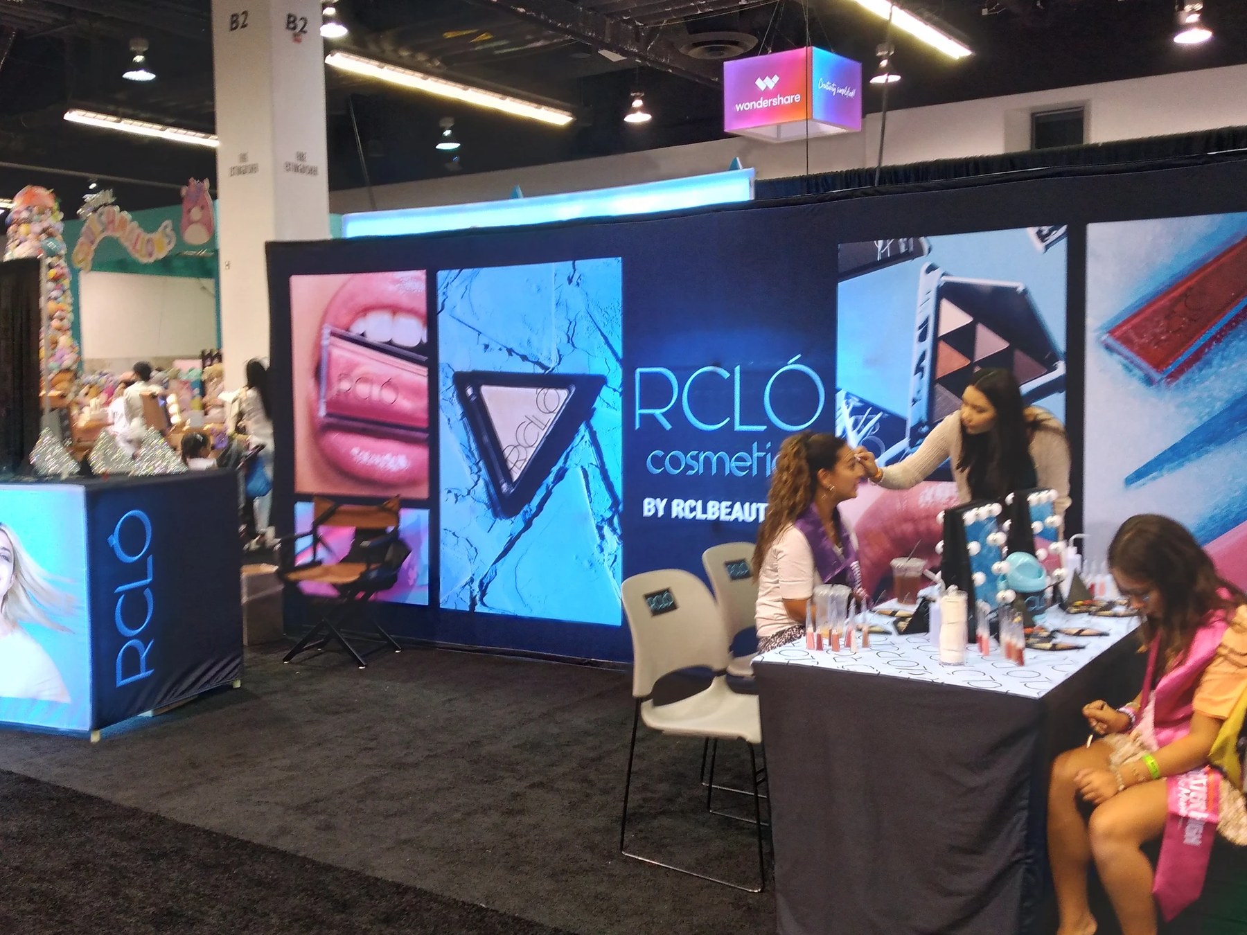 RCLÓ Cosmetics booth by RCLBeauty — Rachel Levin's cosmetics line at retail event